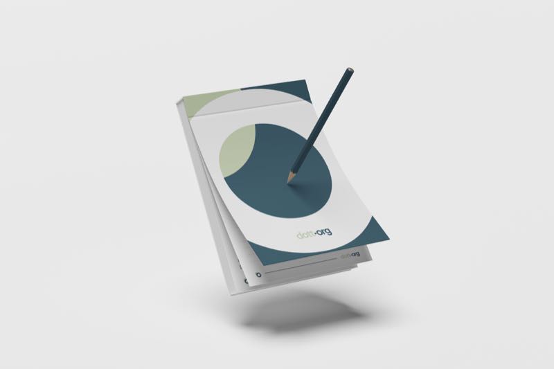 dott.org folder and notepad on cream